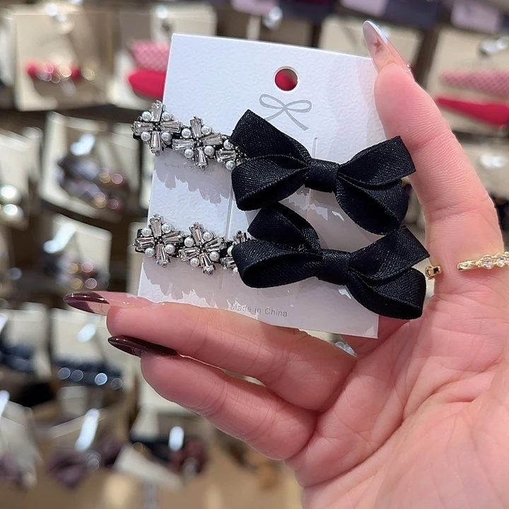 黑色缎面蝴蝶结钻钻一字夹