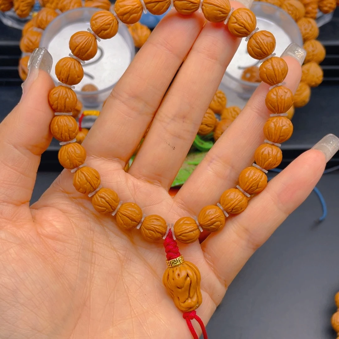 桃核手串子*见健健康康平平安安9