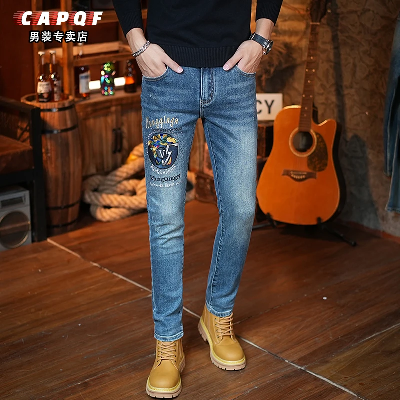高端刺绣蓝色牛仔裤男士修身小脚2025秋冬爆款潮牌潮流韩版裤子男