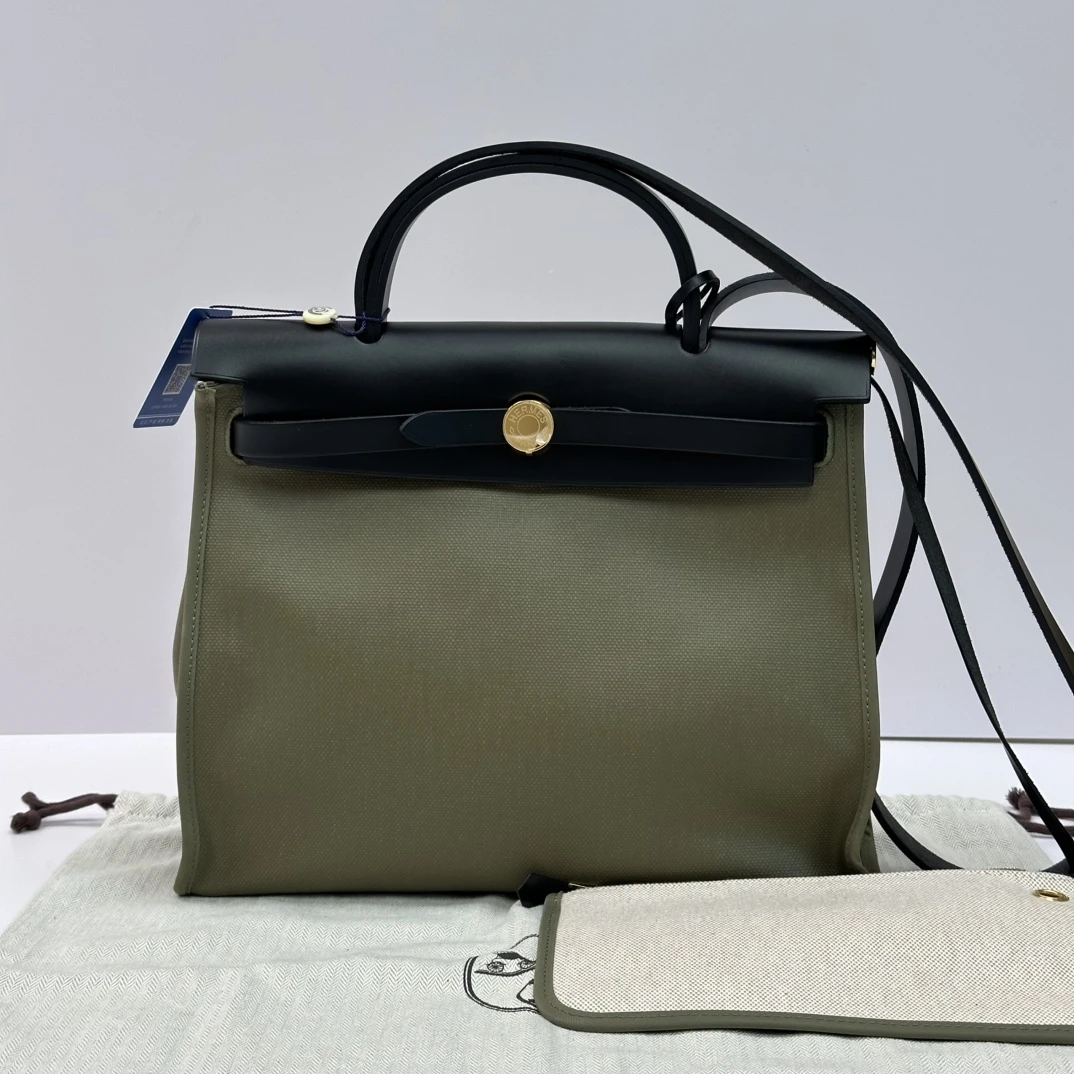95新 Hermes/爱马仕 herbag31防水布拼色皮手提斜挎包 51383