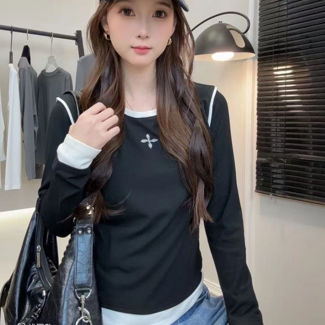 黑白色“烫钻十字”长袖上衣女
