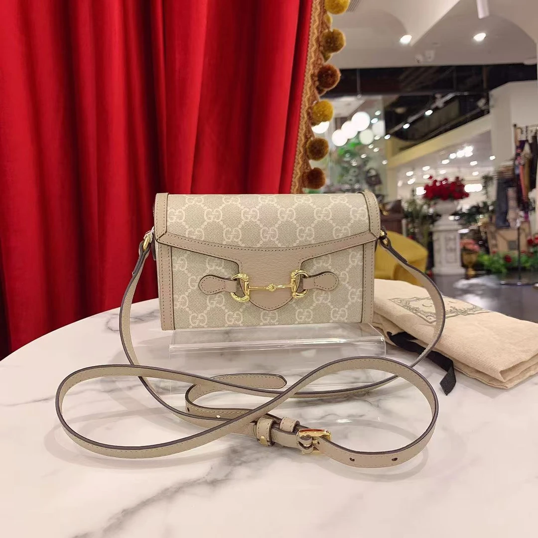 95新 GUCCI/古驰 GGS1955横版手机包燕麦色金扣单肩包69654847