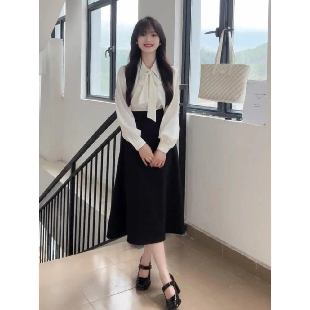 学院风黑色a字半身裙女夏季显瘦高腰垂坠感中长裙伞裙西装裙子女