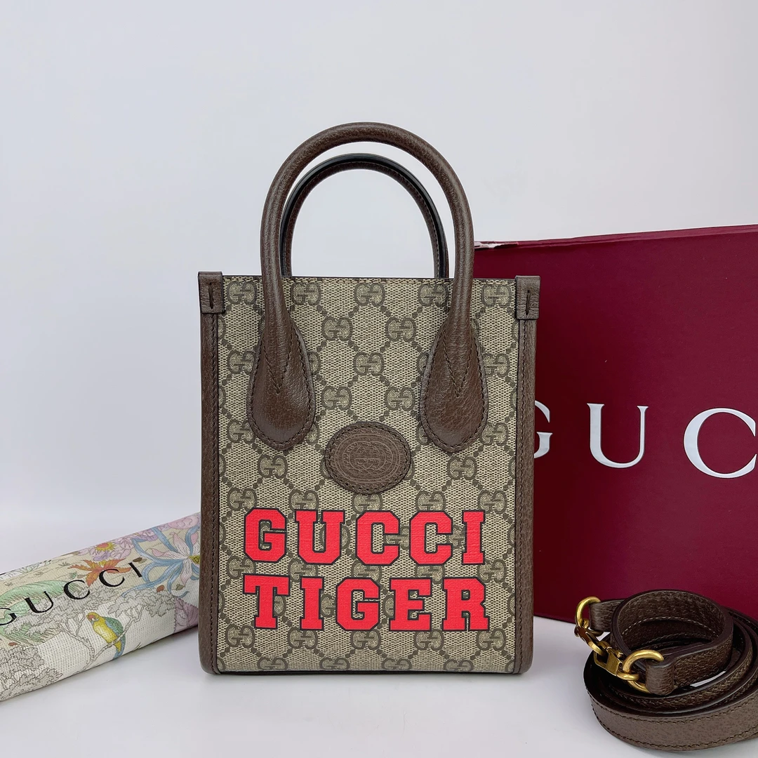 99新 GUCCI/古驰 古驰 棕色老花琴谱单肩包底长16 E236