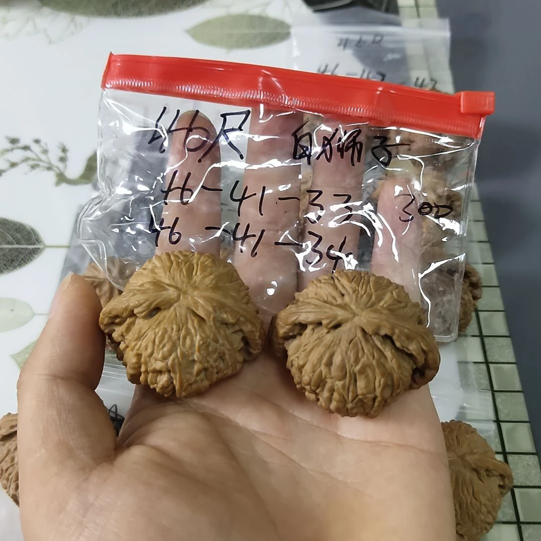 文玩核桃把件文玩核桃把件白狮子