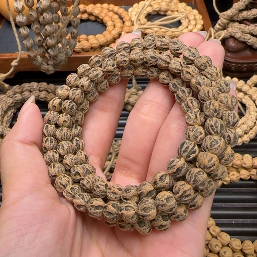爱***己柏香籽/百香籽吊坠