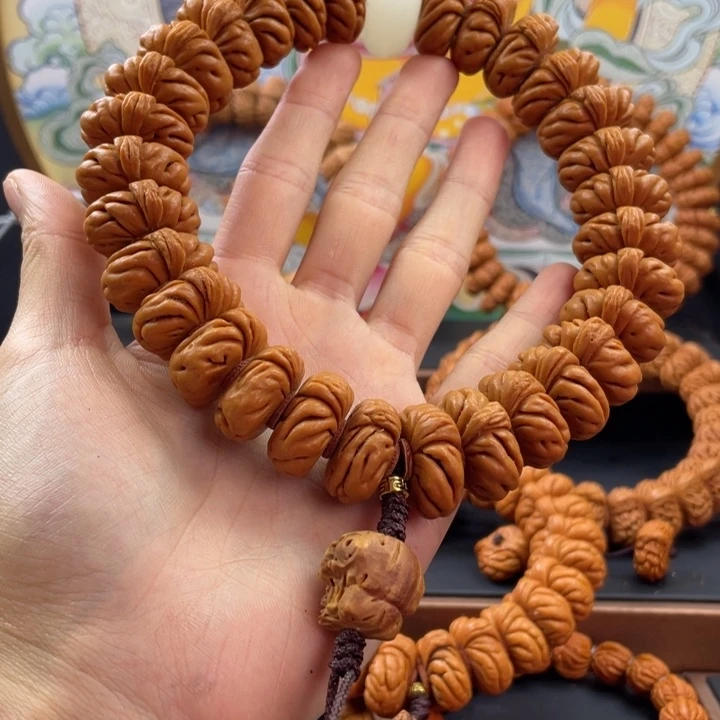 桃核手串茶**道龙纹桃核白玉龙