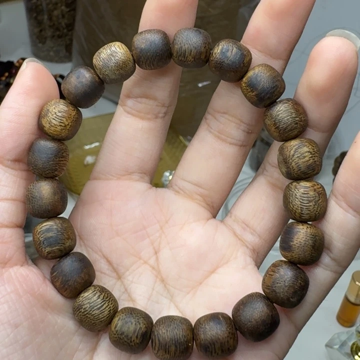 丽***舟扇子奇楠沉香老型珠鼓珠