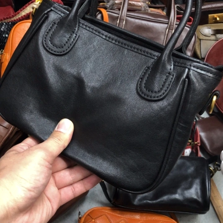 幸***星头层牛皮黑色水晶菜篮子