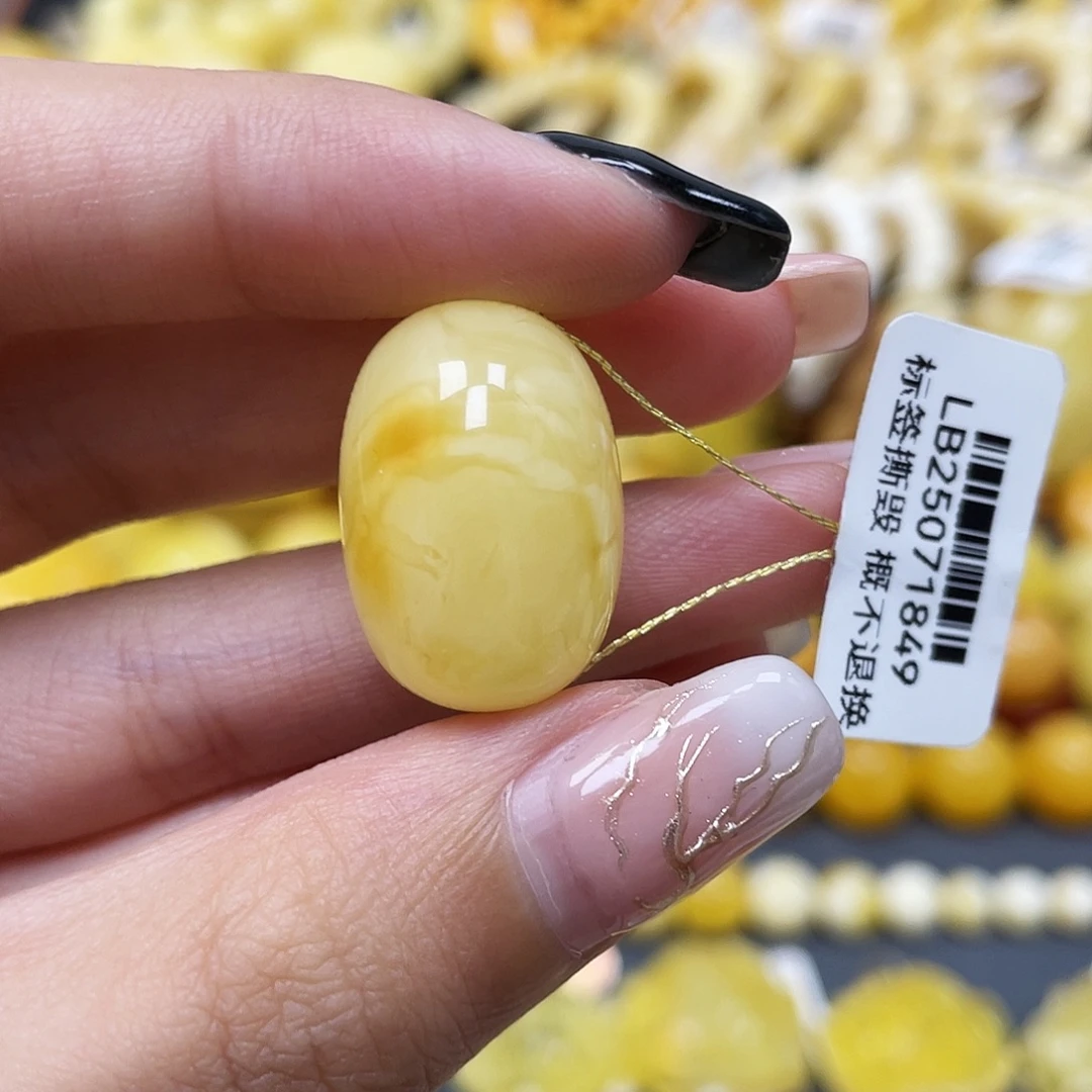 琥珀未镶嵌裸石22.5*15.3mm蜜蜡枣珠 俏色