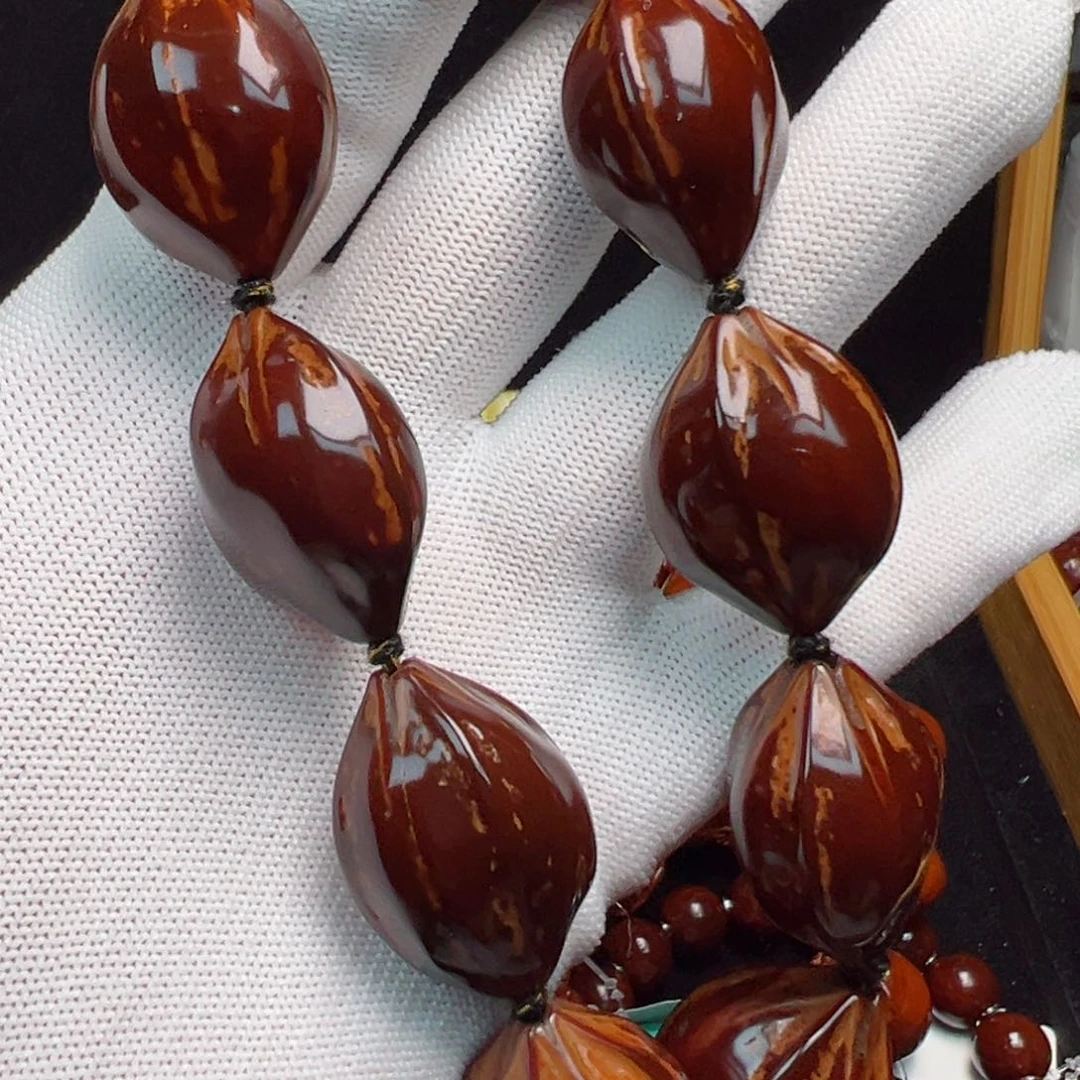 许***，橄榄核吊坠85446788778888