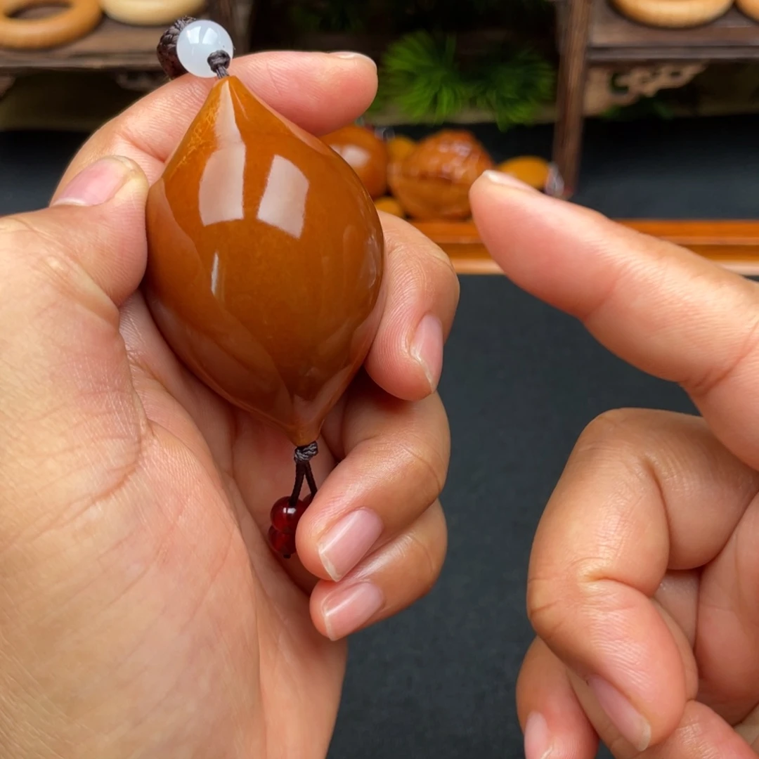 橄榄核吊坠蝴蝶37穿配