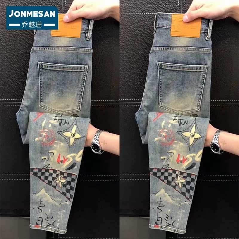 2025年秋季潮流休闲裤男高端水洗小脚牛仔裤弹力修身印花蓝色裤子