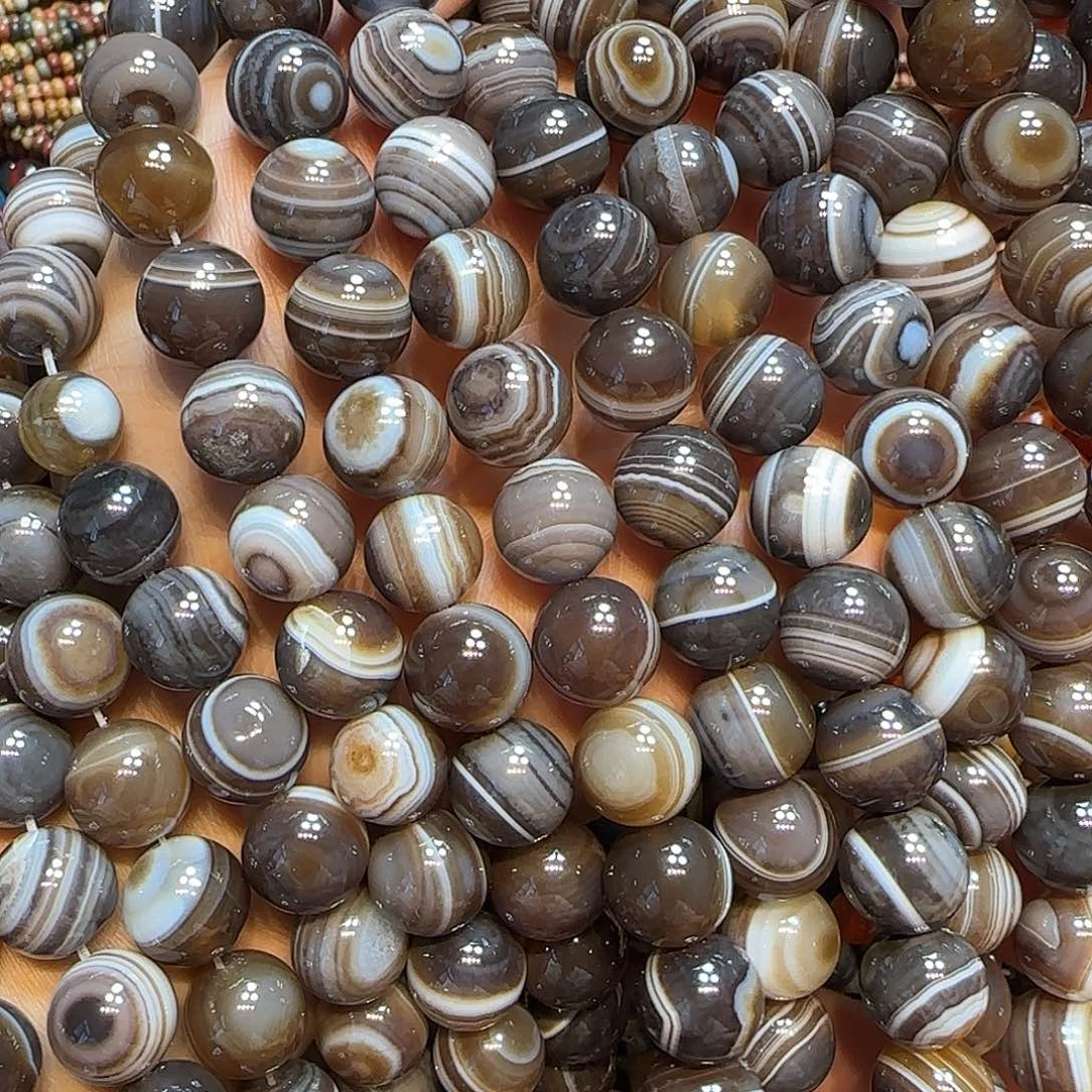 玛瑙/玉髓未镶嵌珠宝半成品12mm蚕丝板眼烟灰色一条