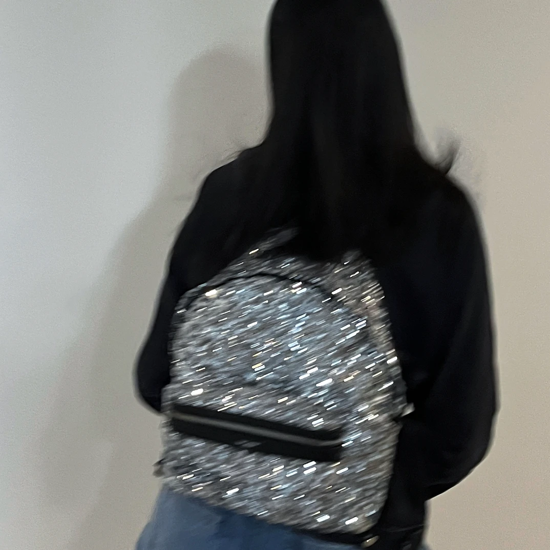 95新 YSL/圣罗兰 YSL 95新/二手 LL 银色星空亮片男女通款双肩包