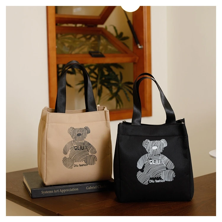 2025新款防水手提包加厚牛津布餐盒包大容量妈咪包简约通勤学生包