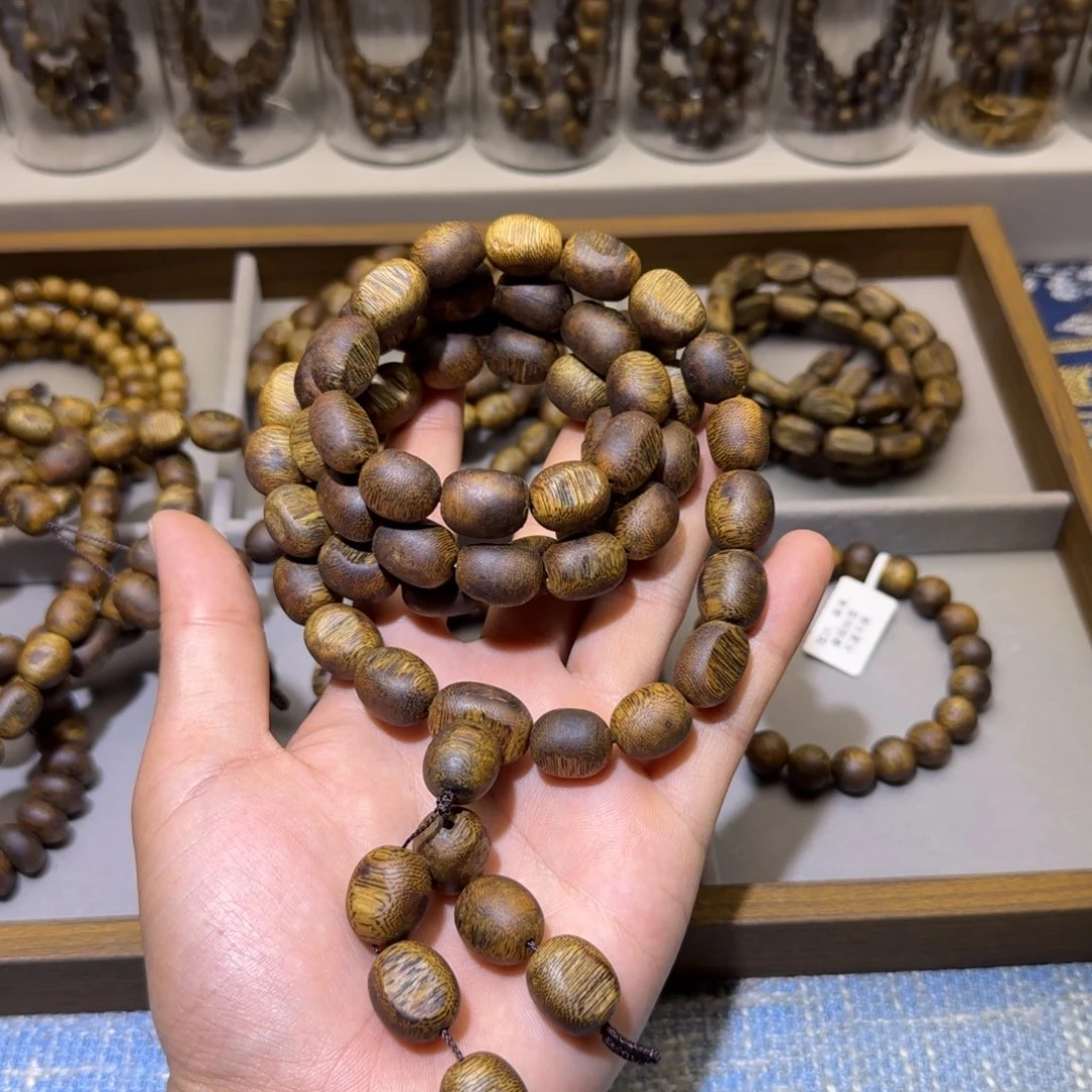 沉香香囊沉香海南乌身白棋沉水浮留疤1.2多圈59+