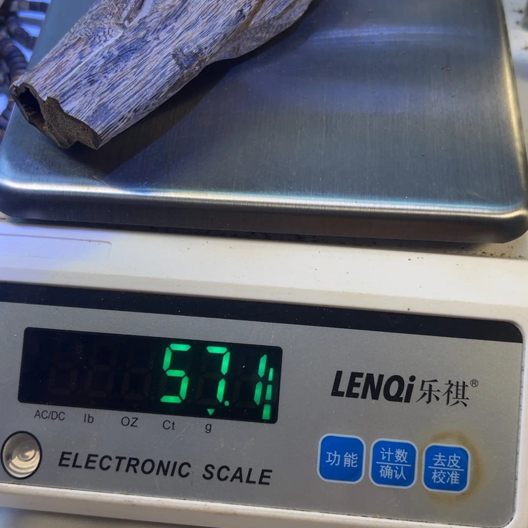 沉香沉香碎屑用****7白奇楠乌身手把件