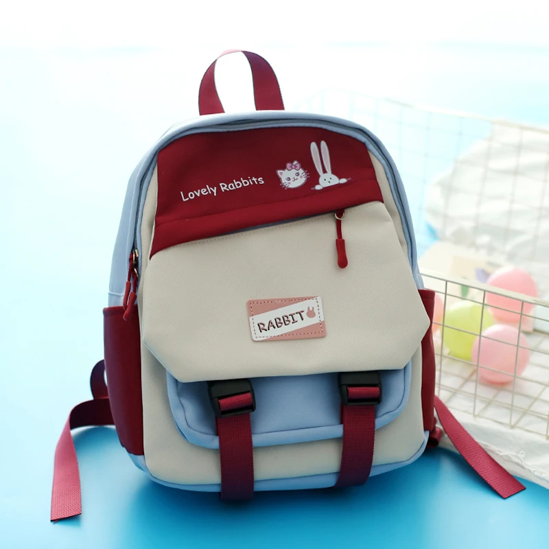 撞色小双肩包女2025新款可爱春游小背包旅游轻便儿童小书包幼儿园