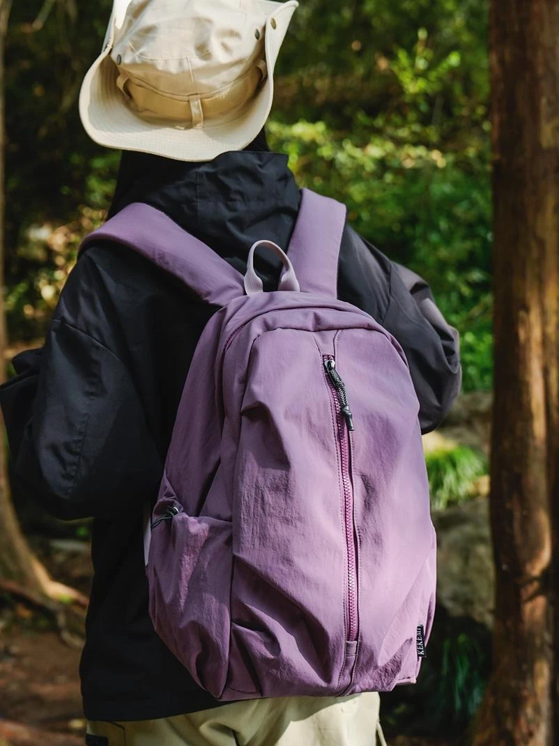 双肩包女士轻便休闲包书包初中女生高级感紫色户外登山包男生背包
