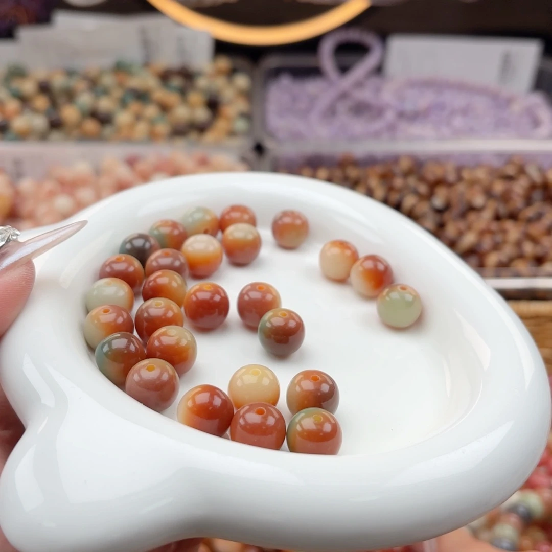 白玉菩提吊坠q12mm110颗。橘日落