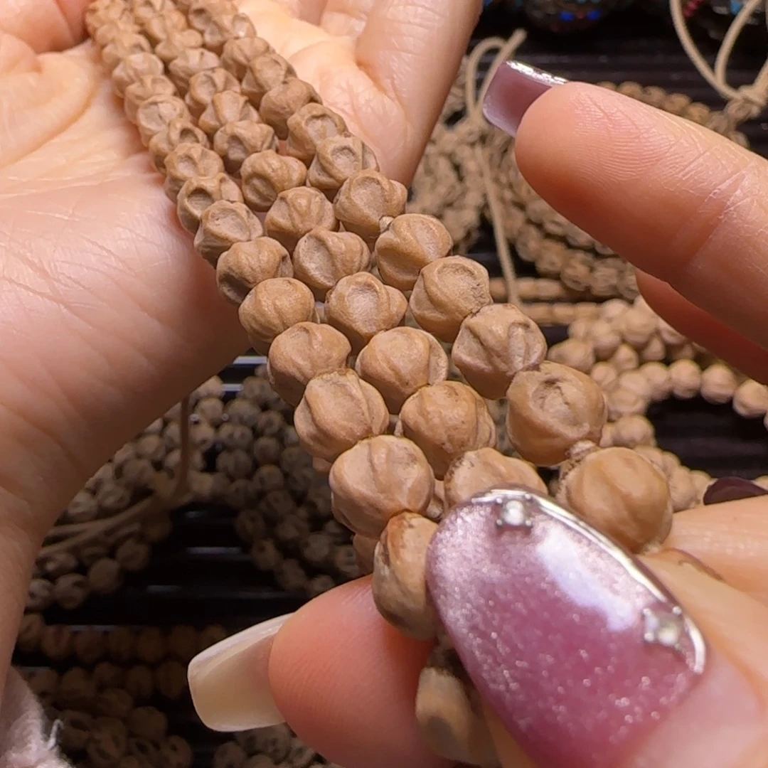 裴***维柏香籽/百香籽吊坠