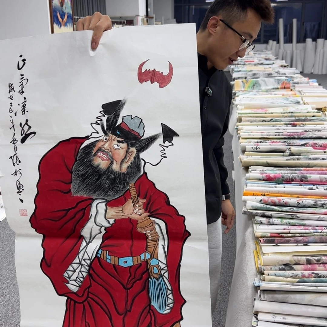 国画卖字画的小男孩