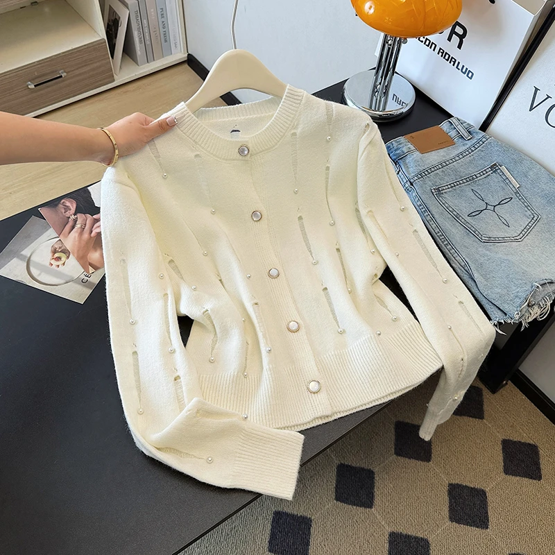 法式重工钉珠镂空竖条纹毛衣女秋季2025新款甜美宽松单排扣针织衫