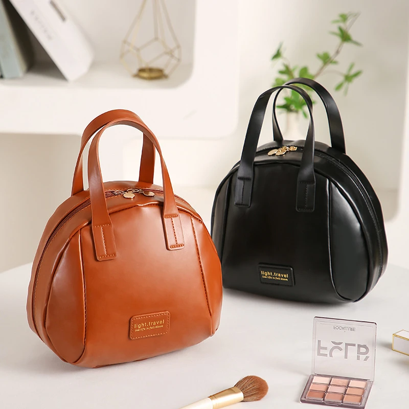 新款PU贝壳化妆包简约时尚手拎包女士小包包化妆品洗漱用品收纳包