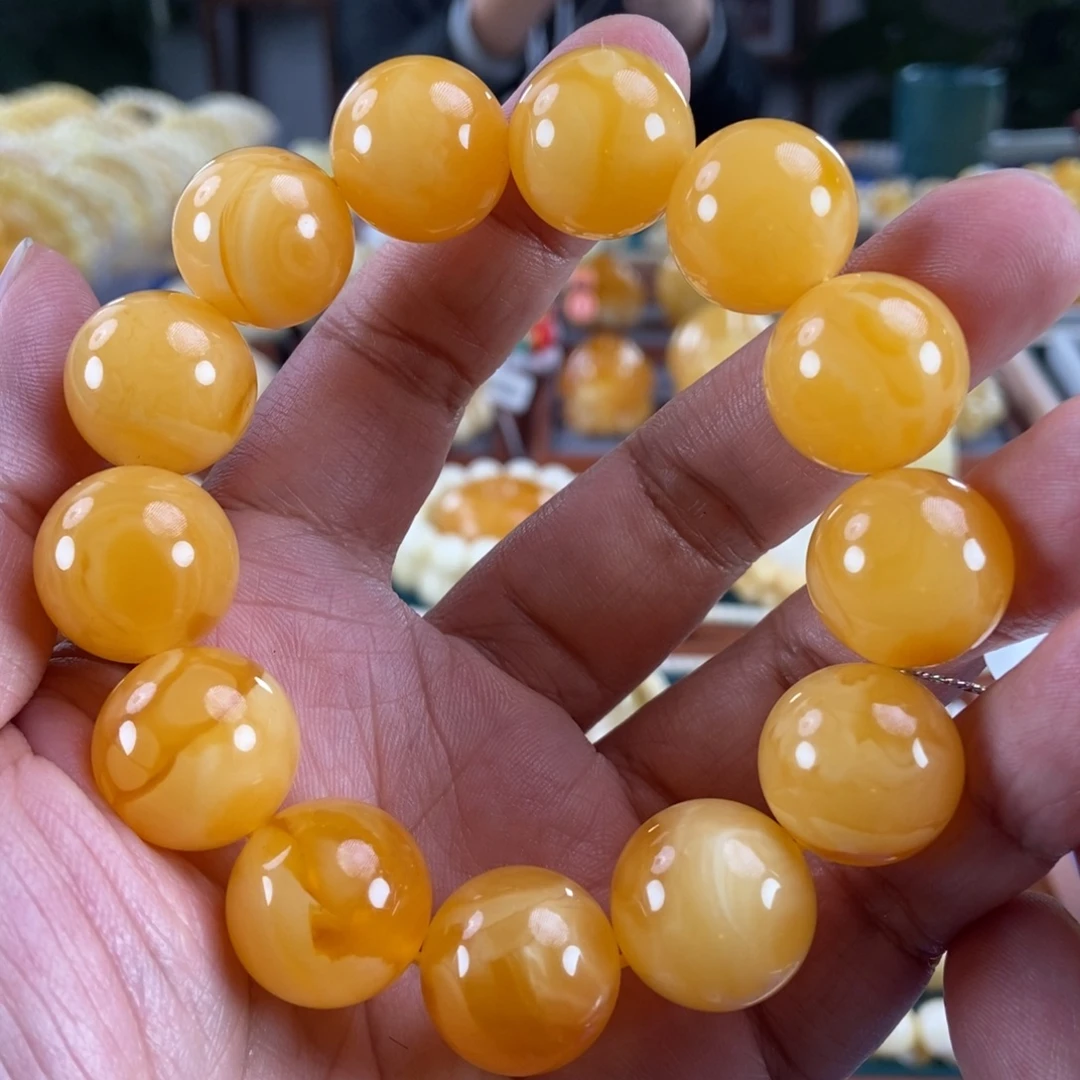 琥珀未镶嵌珠宝奇石18鸡油红橘妖花手串45.56