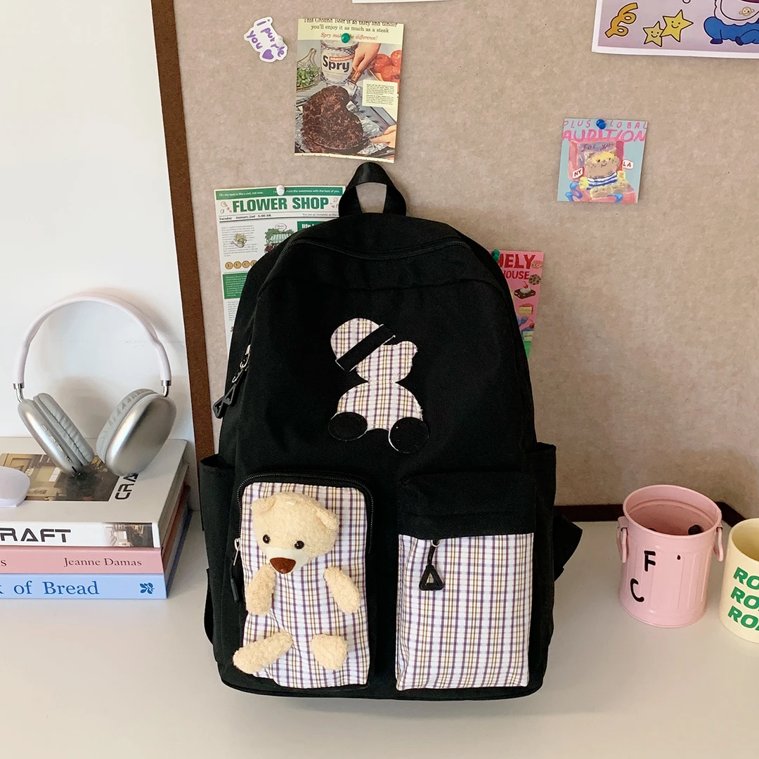 小学生书包1-3-6女生日初中生卡通可爱男生出游格子百搭双肩背包