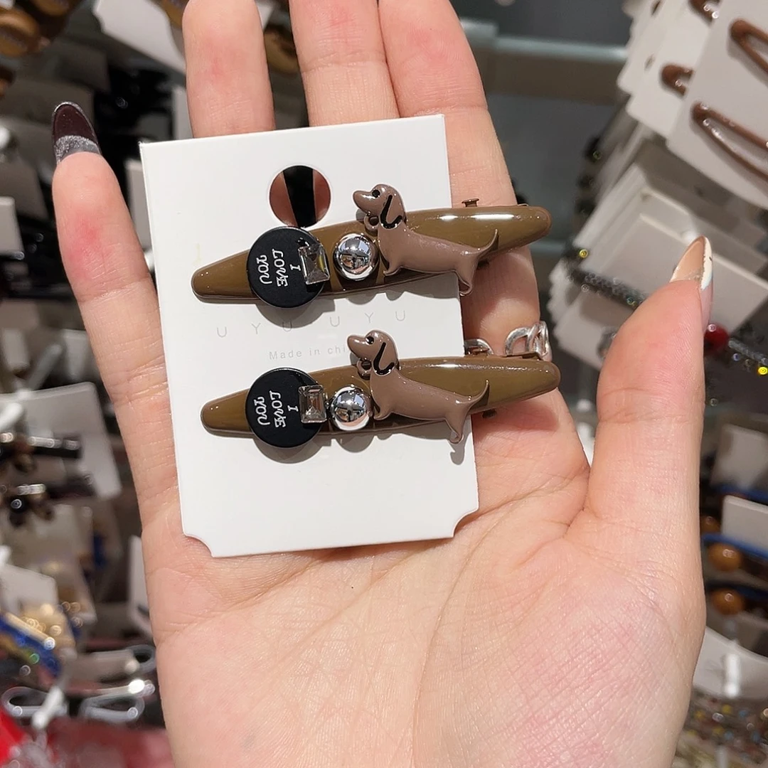 铁合金树脂咖色腊肠狗