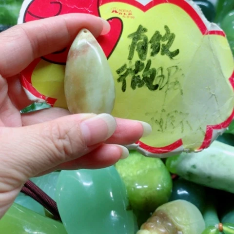 未镶嵌蛇纹石玉手把件