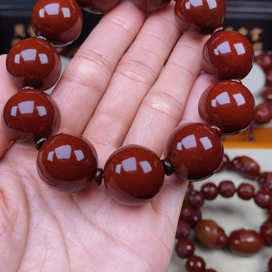 紫***来橄榄核吊坠正圆光珠