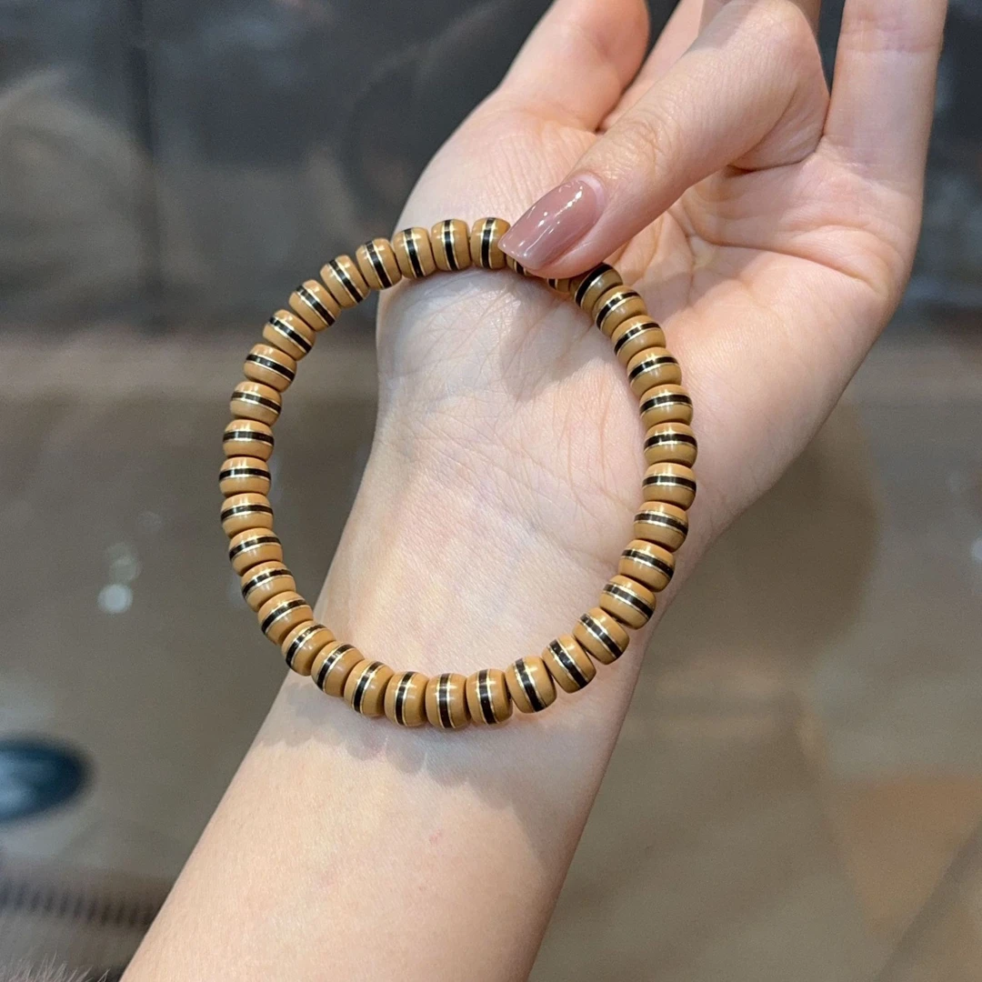 橄榄核镶纯铜椰蒂单圈一线药师直切精品盘玩手串