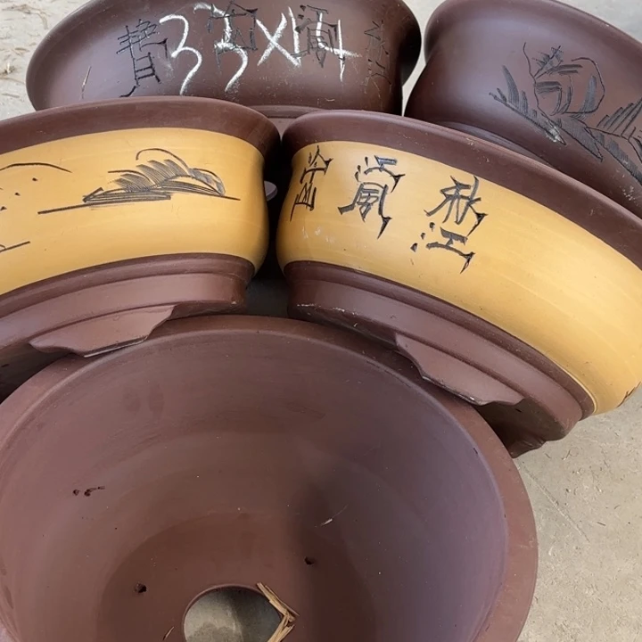 紫砂花盆100-5。   33-14。