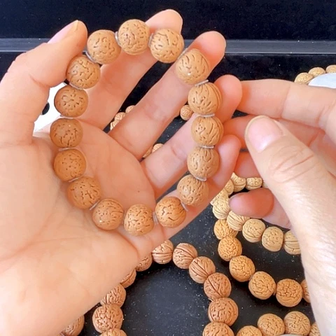 桃核吊坠凡****妄桃核手串