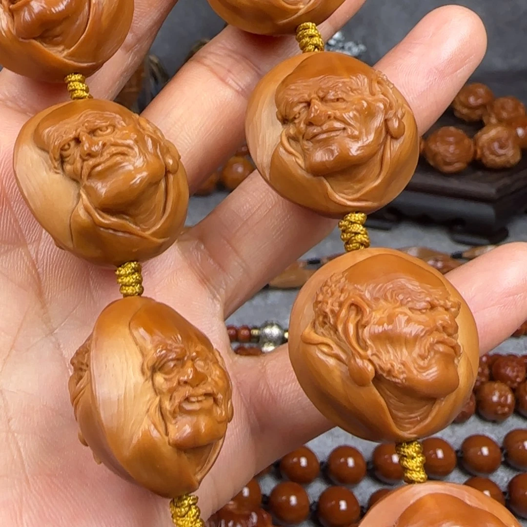 橄榄核吊坠油核浮雕8罗汉