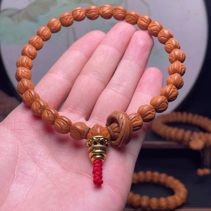 见***海桃核手串10玉龙脊手持