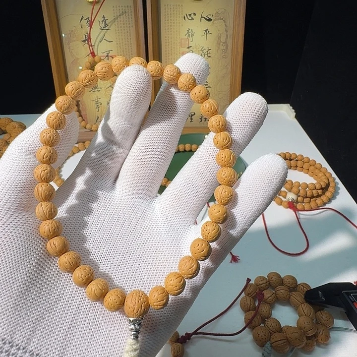 阿***彩桃核吊坠野生小黄桃