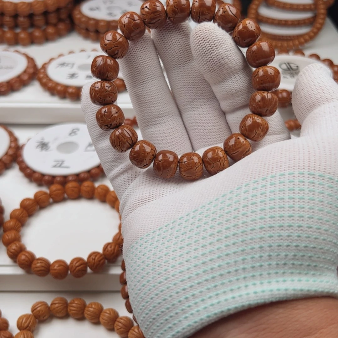 张***星吊坠桃核桃核手串