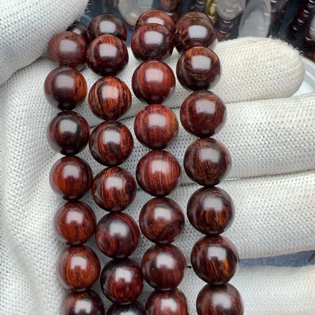 木海南红降花梨公1.0圆珠黑金满文