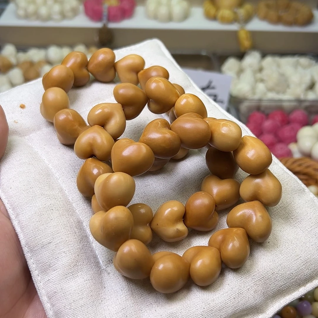 菩提根/象牙果吊坠咖色爱心一条孔道裂