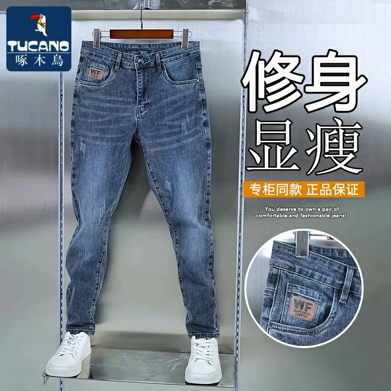 啄木鸟秋冬款加绒牛仔裤男士修身小脚2025新款潮流百搭休闲长裤子