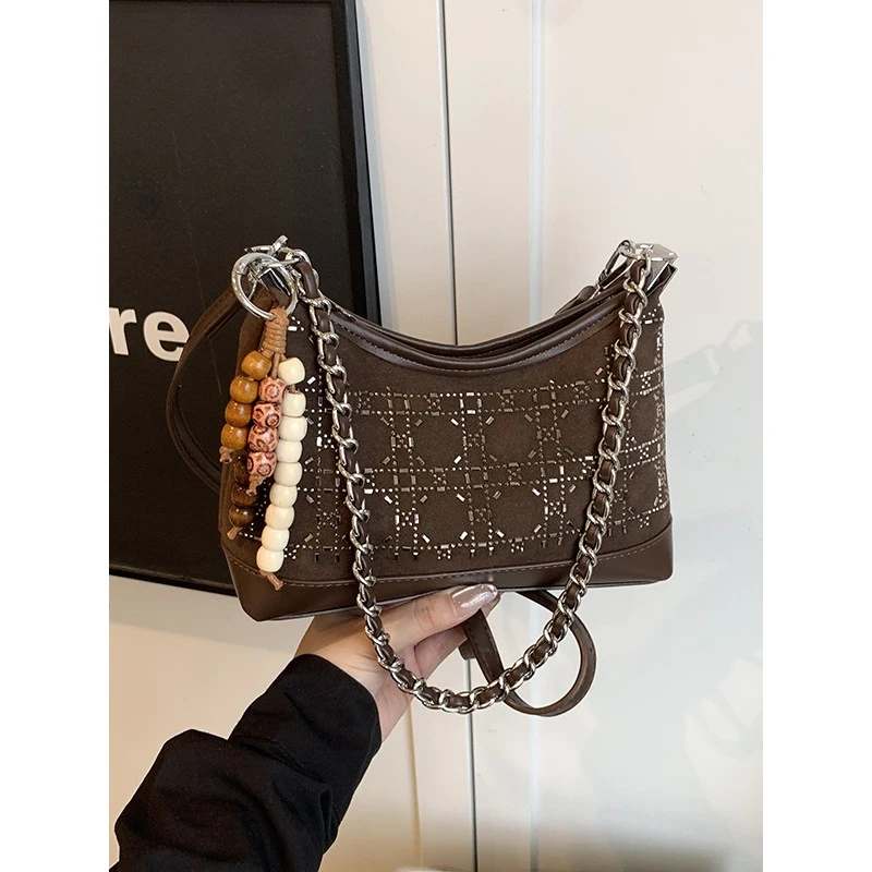 麂皮绒小众设计包包女2025新款潮时尚百搭复古通勤链条斜挎水桶包