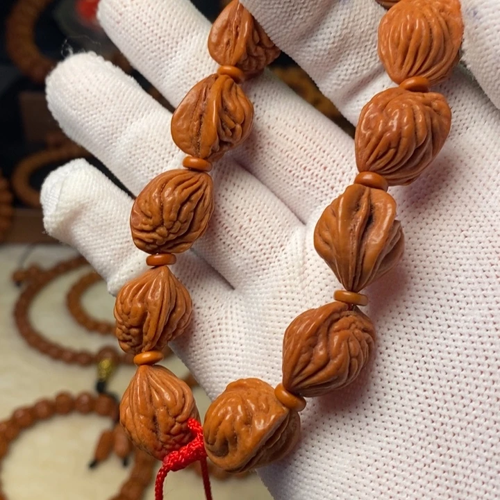 骑***徐桃核手串秦岭龙纹桃核