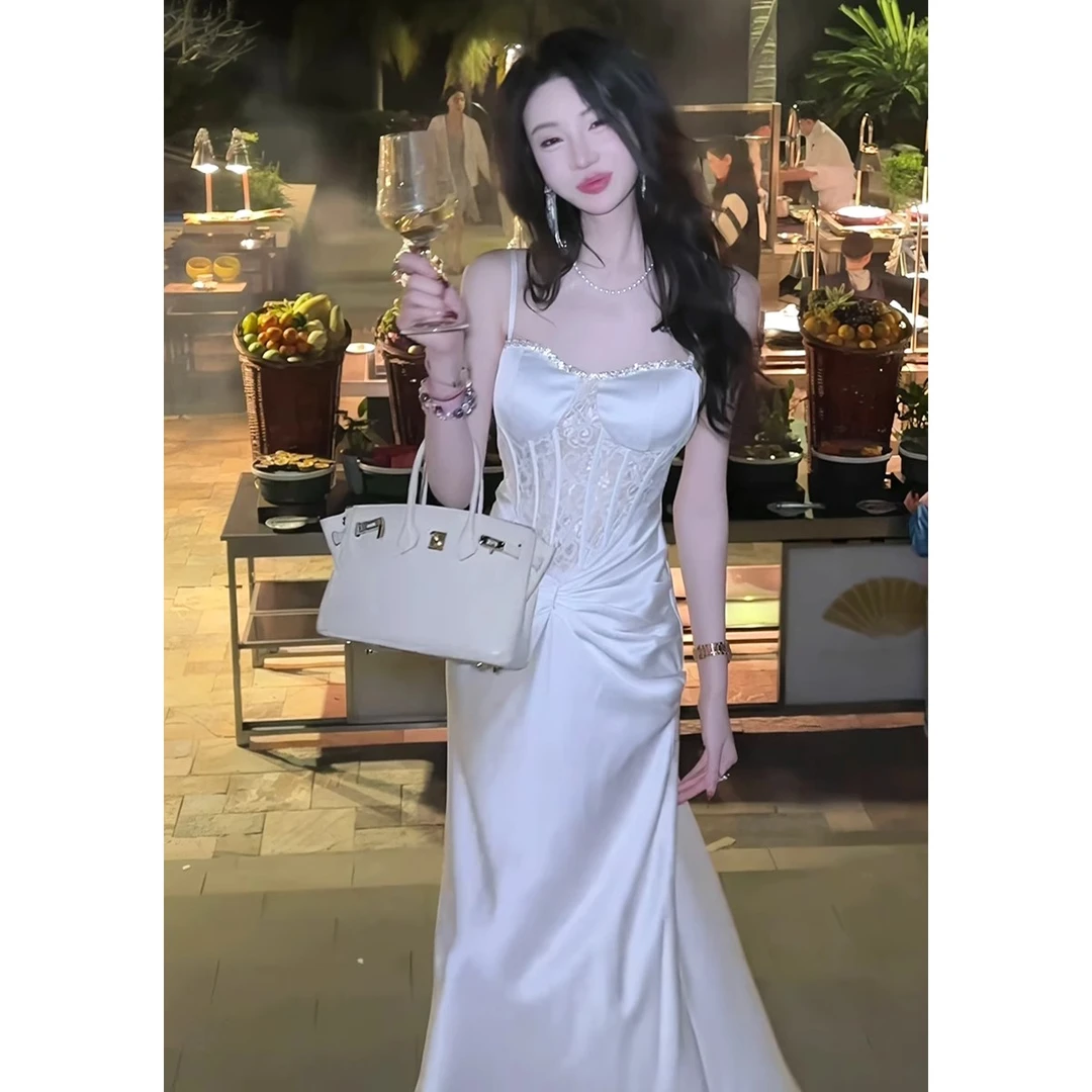 法式高端精致蕾丝拼接吊带连衣裙女2025春季新款设计收腰礼服长裙