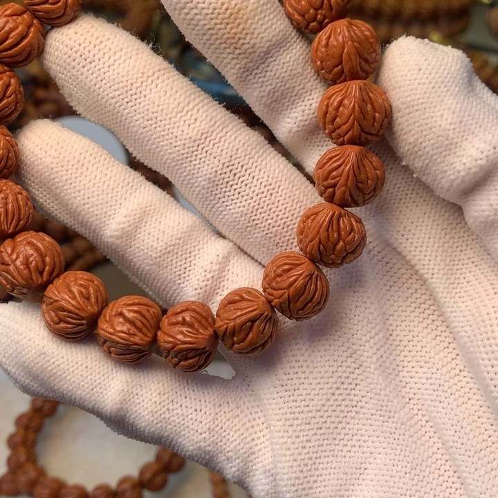 乌***i桃核手串秦岭龙纹