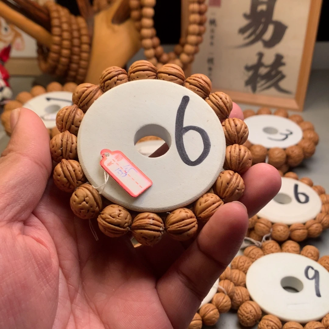 用***9手串桃核1.5大笨象桃核手串