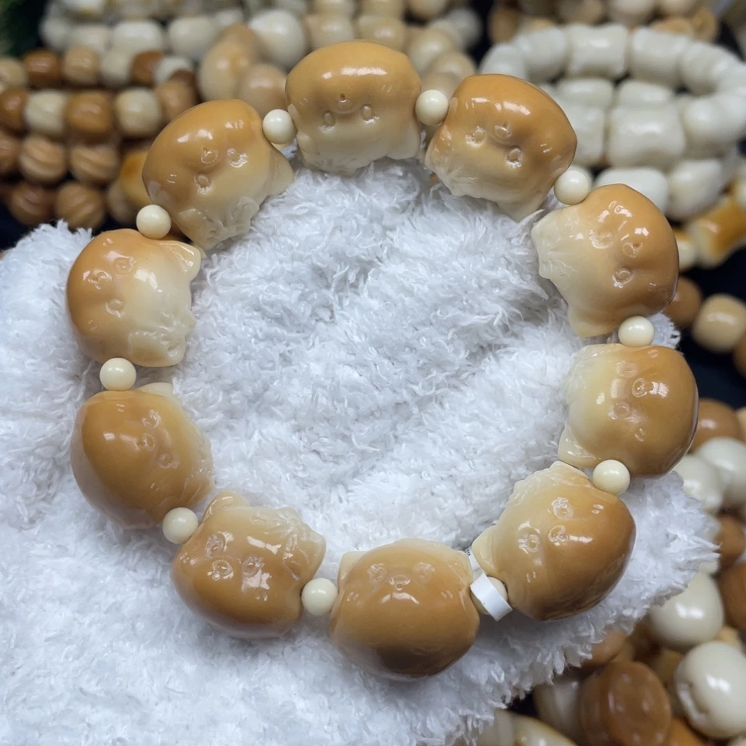 菩提根/象牙果手串12.25.36微瑕蝴蝶结小熊